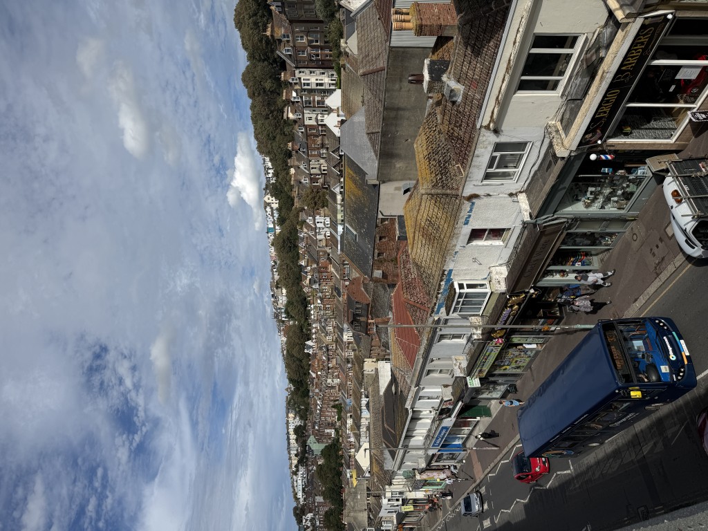 Lot: 82 - MIXED RESIDENTIAL AND COMMERCIAL BUILDING WITH POTENTIAL - View of Hastings town from roof terrace of building